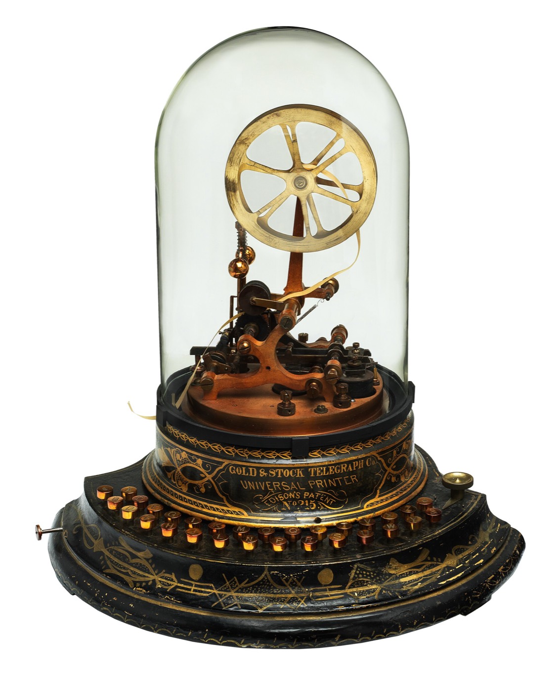 An Edison universal stock printer under its glass dome